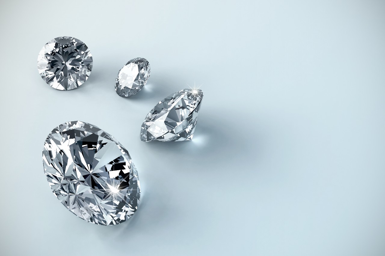 Four brilliant diamonds cut in different shapes