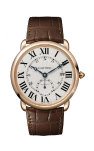 This Cartier watch has a sleek round shape