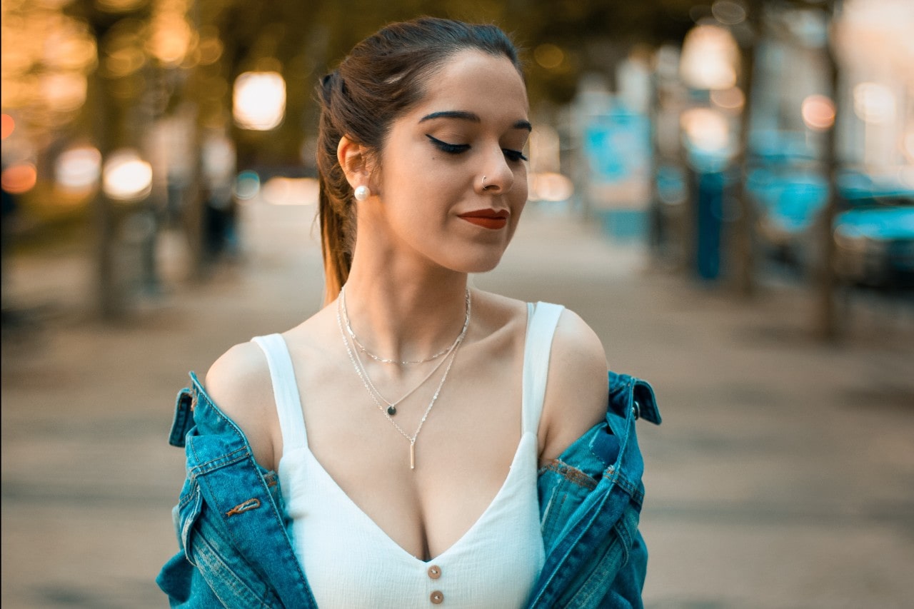 Fashionable woman enjoying a warm summer day with stylish jewelry