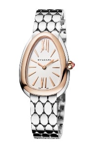 A metal women’s watch with mixed metal details and a textured band.