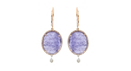 a pair rose gold drop earrings featuring large purple gemstones