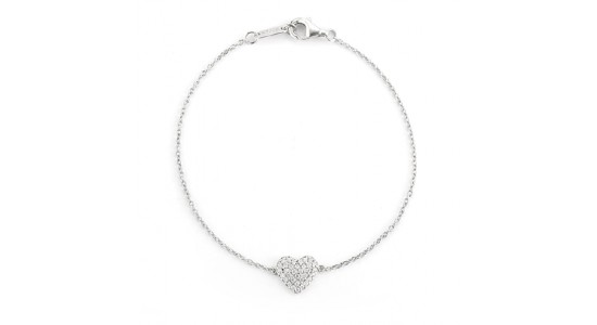 a white gold bracelet with a diamond studded heart motif