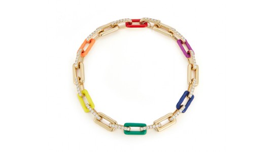 a yellow gold chain bracelet featuring multicolored ceramic links and diamond accents